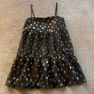 New, never worn black dress with metallic gold dots and adjustable straps